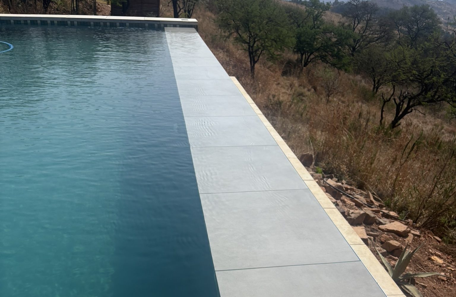 Modern residential swimming pool by Pool Gecko